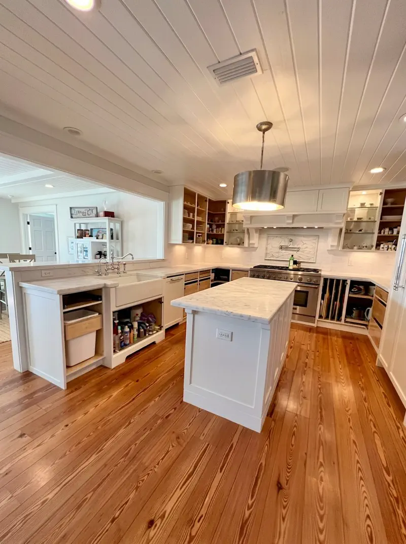 Finished custom white shaker cabinetry with stone countertops in a Northeast Florida kitchen remodel