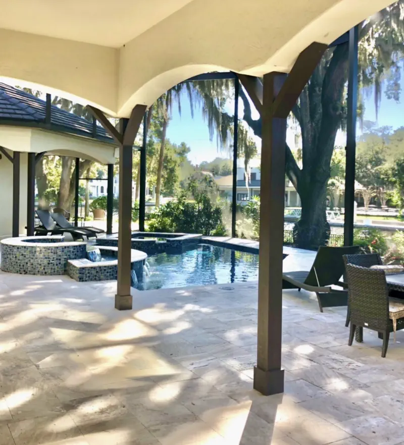 Screened patio and pool with spa cascade in Northeast Florida
